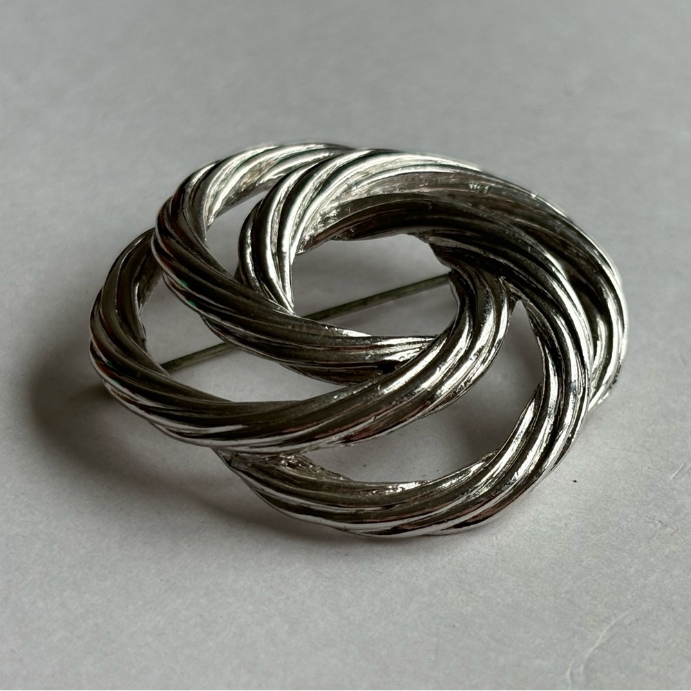 Vintage Monet Swirl metal brooch / silver tone /very good condition / no…